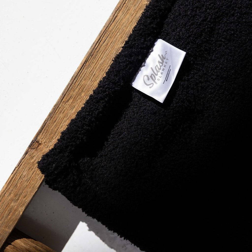 The Waterproof Snuggle Splash Blanket™ - Black