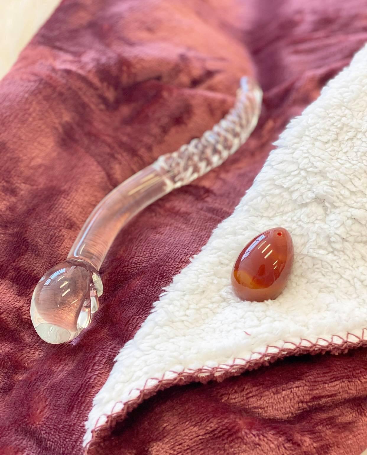 Cervix Moon kit includes waterproof blanket in moon blood red, red carnelian crystal yoni egg and clear glass cervix serpent pleasure wand. 