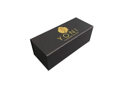 Black box packaging with gold branding on white background.